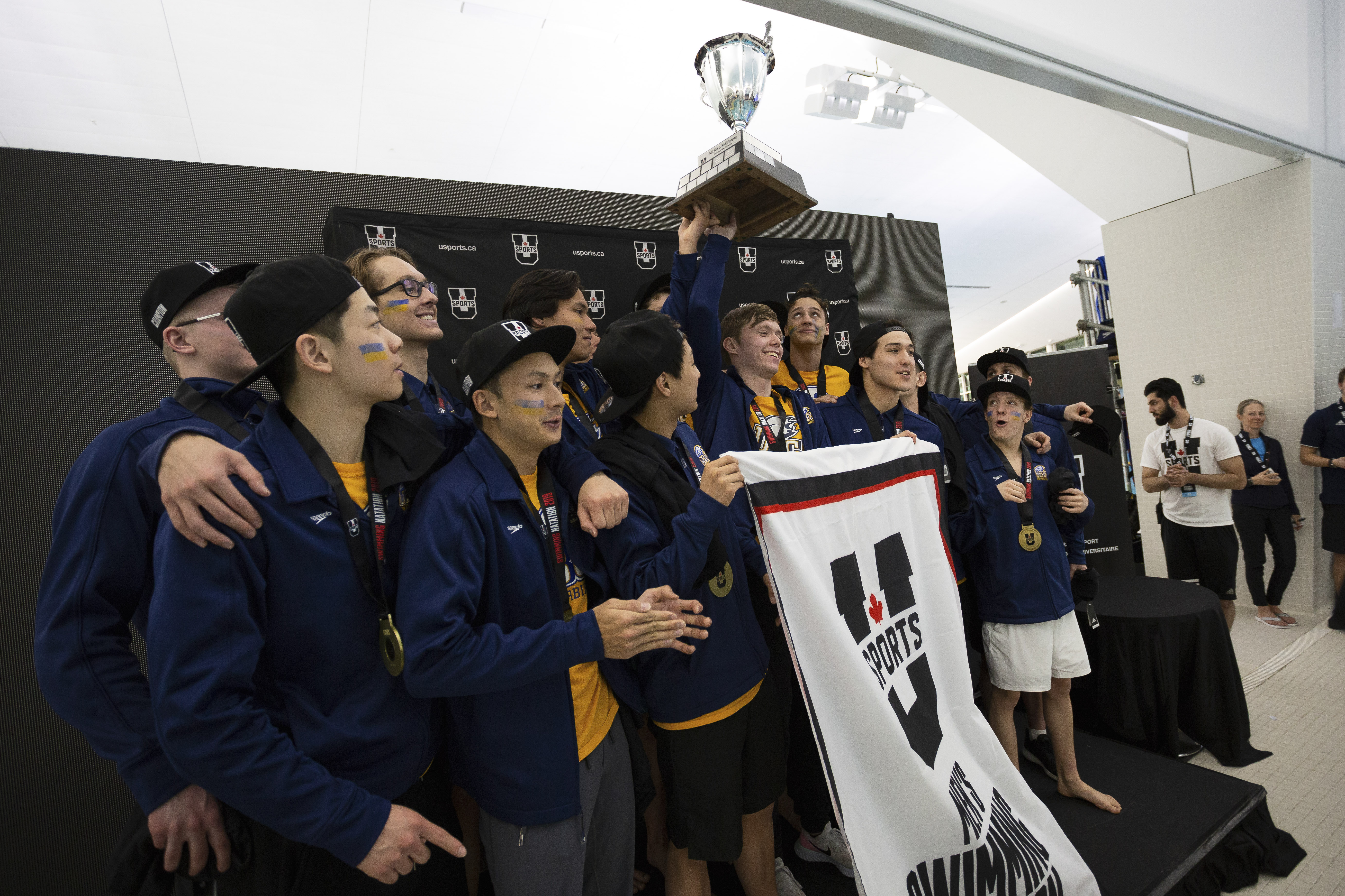 The men's squad took home the U Sports title along with the women's team in front of a home crowd last April.